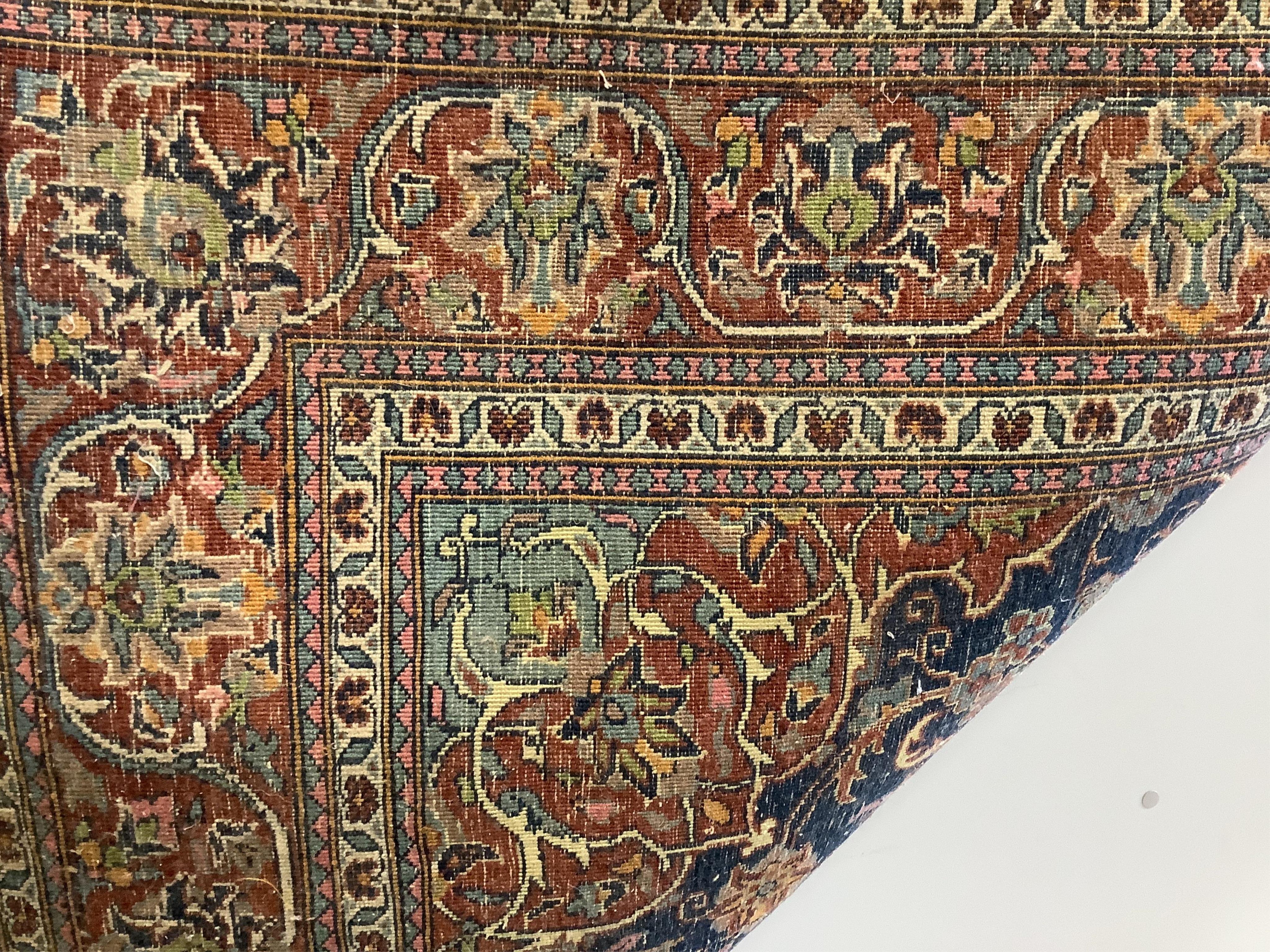 A North West Persian blue ground rug, 184 x 125cm. Condition - fair